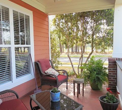 Front porch w/ view of pond