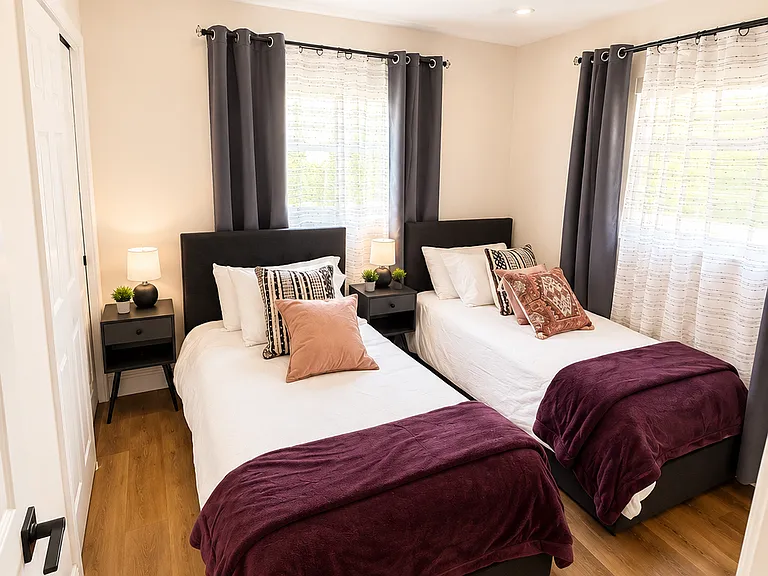 Flexible sleeping space designed to comfortably accommodate larger groups visiting Naples can be configured as two twin beds, or one king bed (bed bridge is provided)