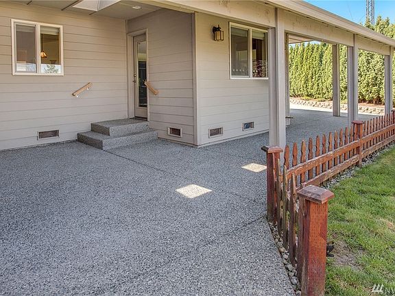 Huge Outdoor covered living area.  Gas-line installed for BBQ of future fireplace.
