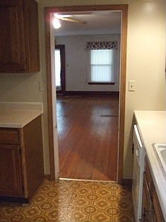 Large living room with hard wood floors