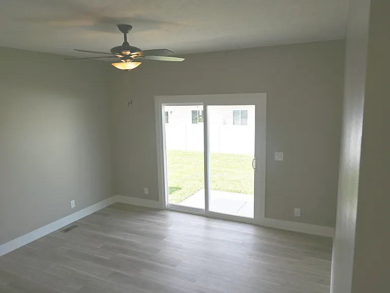 Living room with patio exit.
