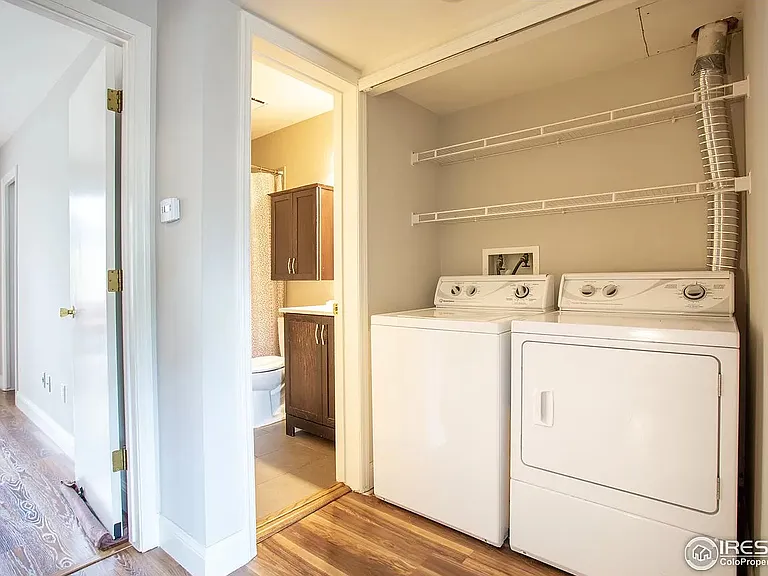 Washer-dryer are in a common area on 2nd floor landing.