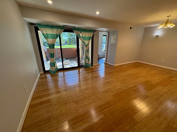View to the balcony and kitchen from living room