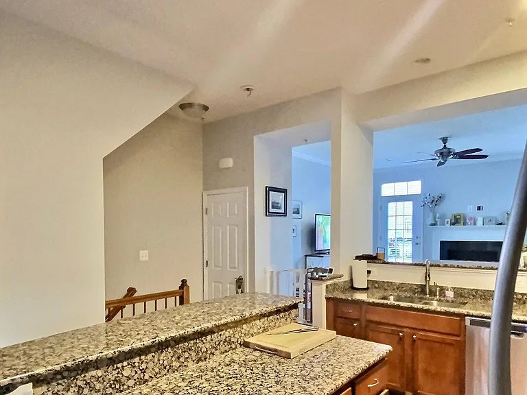 Kitchen looking into living room in background