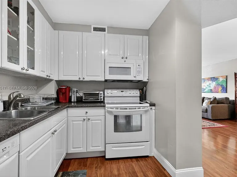 401 Golden Isles Dr #208 — Photo 8