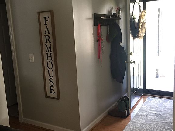 Foyer with glass screen door