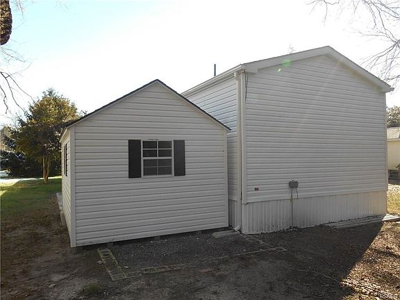 Rear of home with 10 x 15 shed