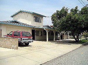 large covered porch and attached garage