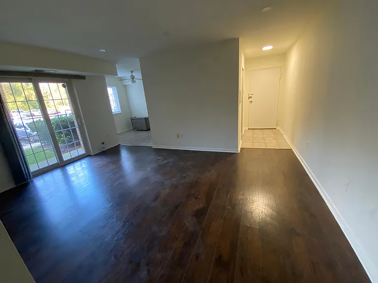 View of ample dining and living area and other room off the kitchen