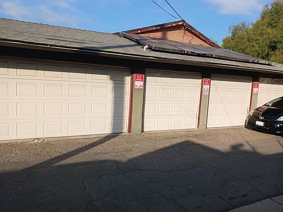 Garage area, Apt #4 has a 1-car garage with garage opener. Garage door opener can be paired to MyQ mobile app.