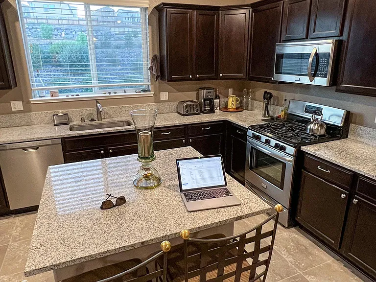 Gas stove and microwave. Coffeemaker.