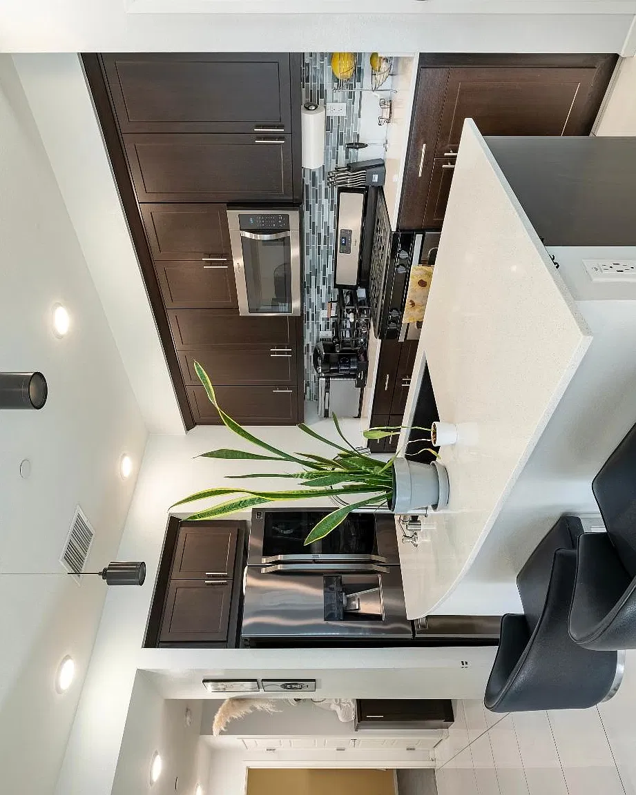 Kitchen with island, brand new large fridge, plenty of pantry space, fully furnished .