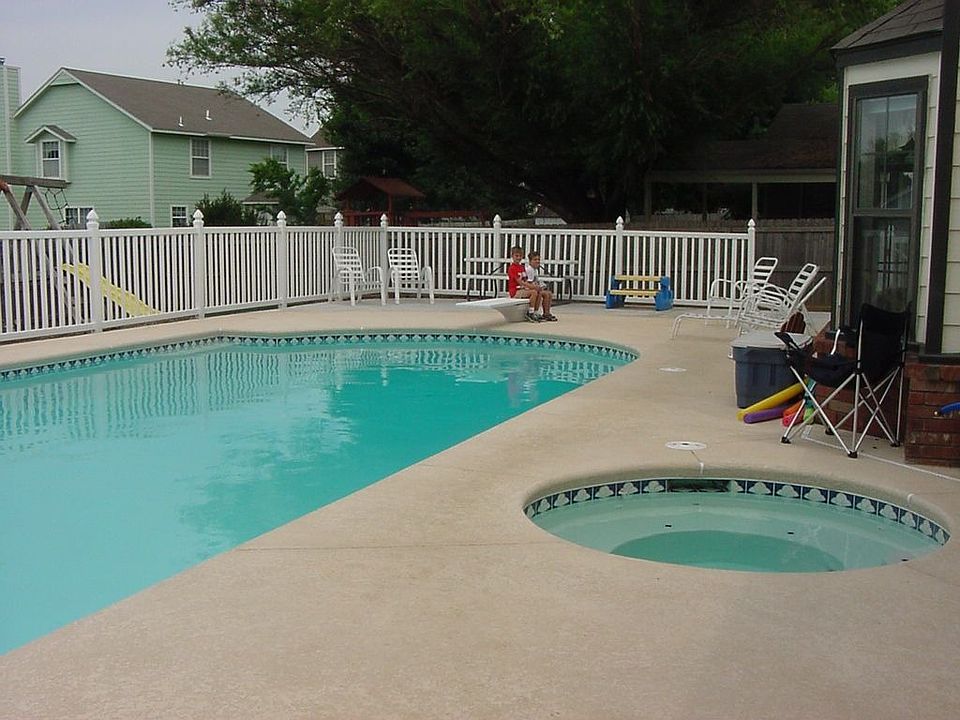 Inground gunite pool 40 X 20, built in 2002.  Has diving board and slide. 