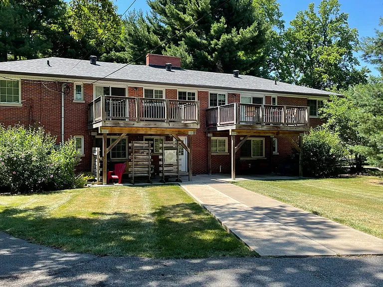 The back of the building. The deck on the right is for the available apartment.