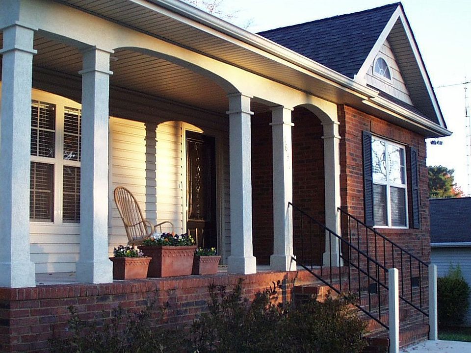 The front of the house faces east toward the Great Smoky Mountains,