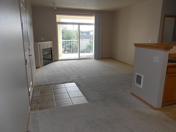 Living room with slider to private patio