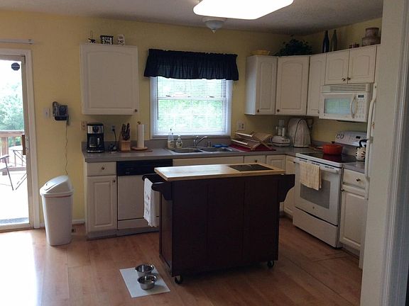 Generous kitchen with private view + spacious deck