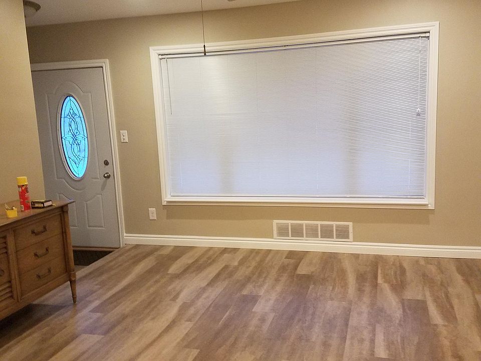 beautiful luxury plank flooring, cathedral ceiling w ceiling fan, spacious great room