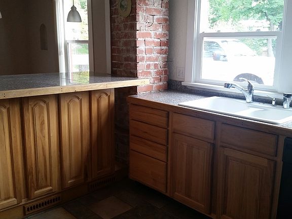 Custom granite tile bar top seating with lots of storage