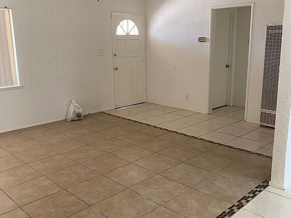 living room with ceiling fan
