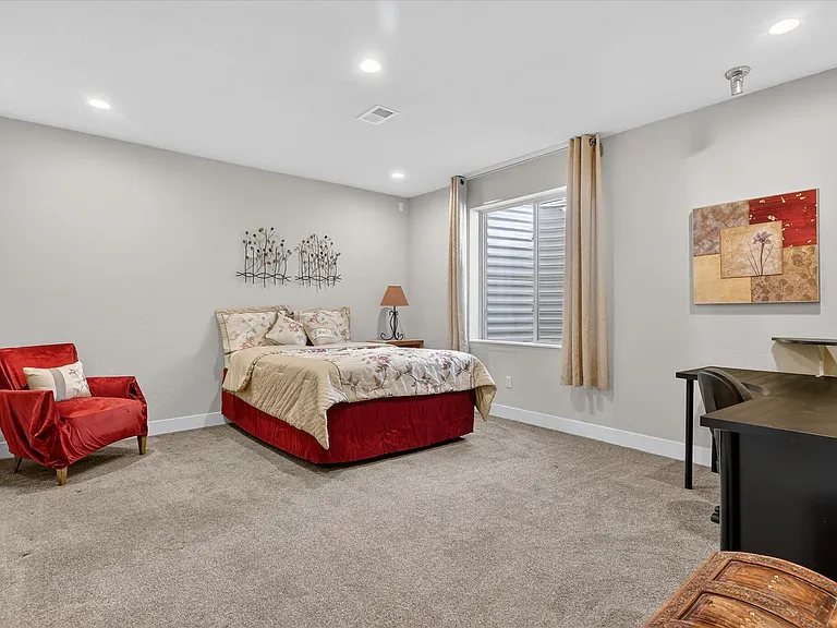 Room in the basement that could be used as a fourth bedroom/guest room