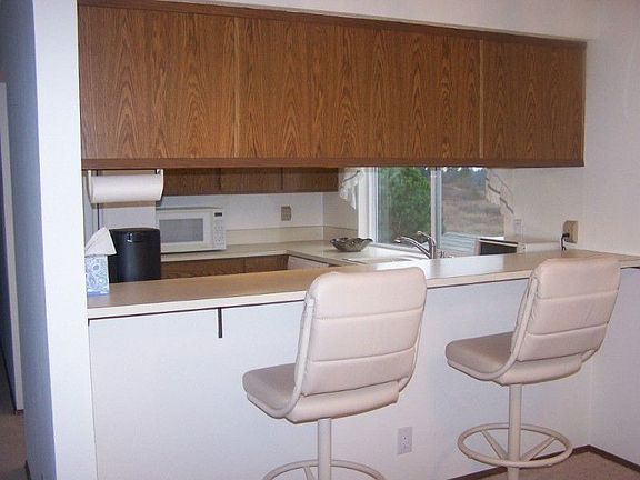 Looking from the dining room into the kitchen area.