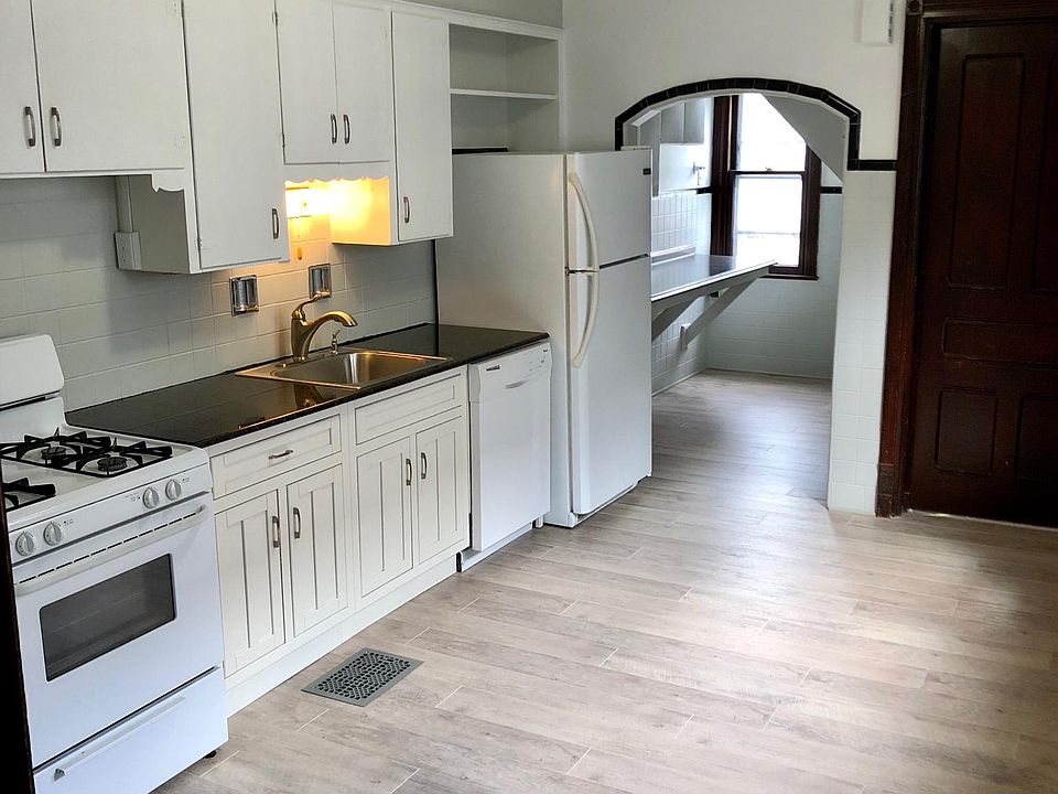 Updated kitchen with granite countertop and huge pantry