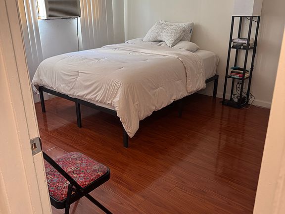 Very large separate bedroom. Can easily fit king. Window AC. Option for next tenant to take queen bed pictured with Saatva mattress.