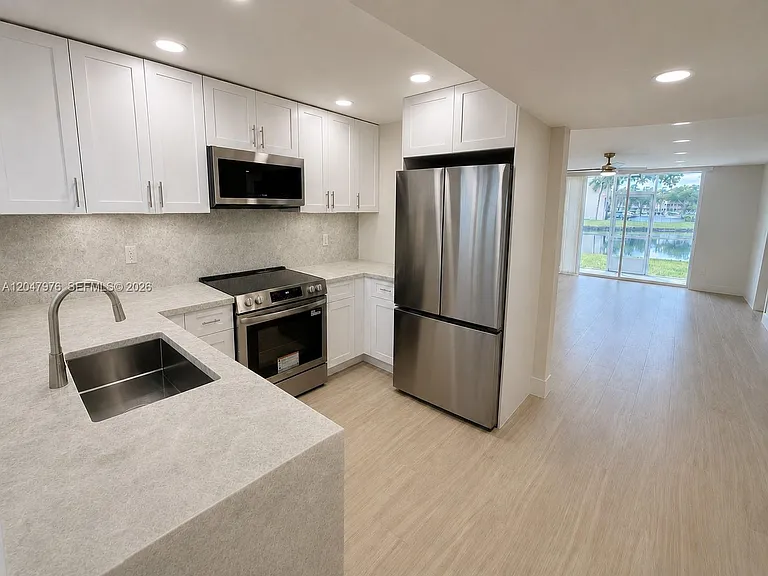 8600 Sunrise Lakes Blvd #102 — Photo 1