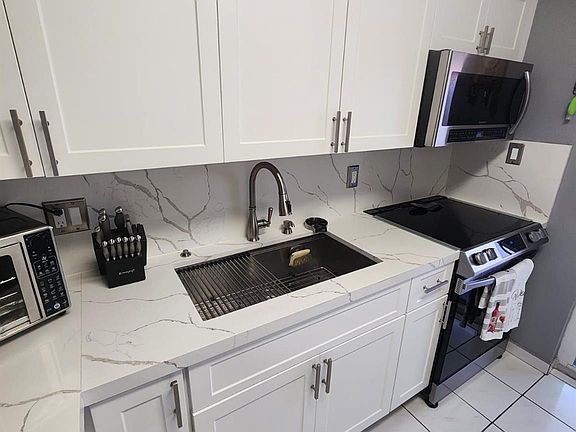 5th image of 7867 W 36th Avenue #201