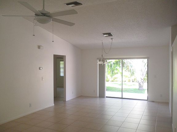 LR/DR 27x15. Property considerably newer than most in this area, very few have vaulted ceilings.