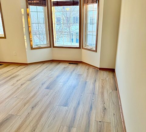 Bright Living Room with new Luxury vinyl plank flooring!