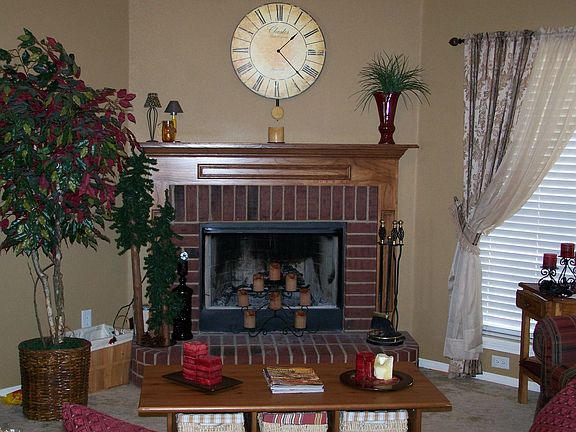 Wood burning fireplace with gas starter.