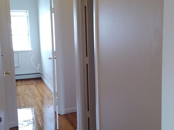hallway to bedrooms and hallway to bathroom-linen closet in hallway