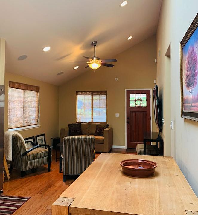 Comfortable living and dining with large screen Smart TV