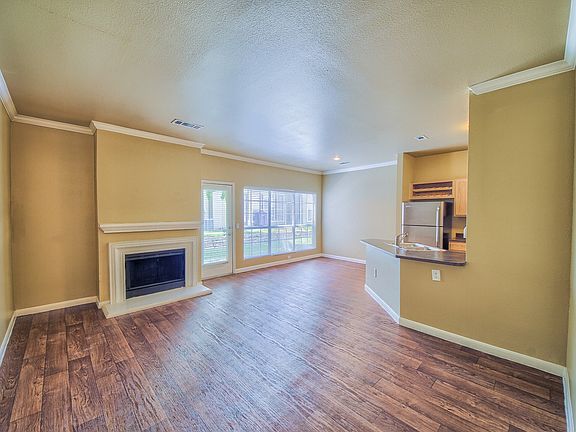 Spacious Living Room with Fireplace