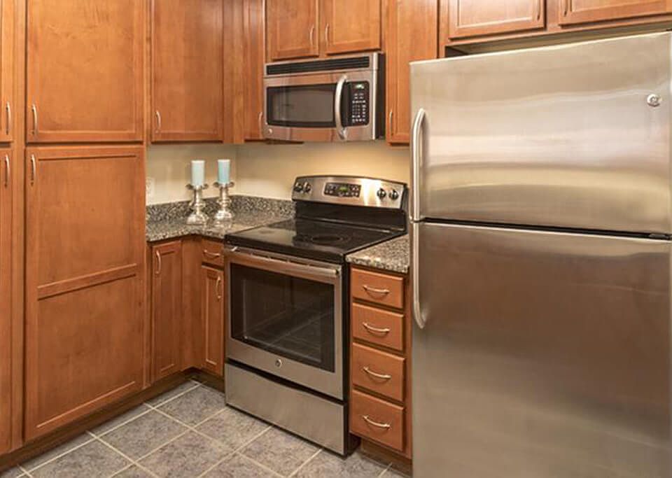 Luxe finishes like stainless steel appliances and granite countertops