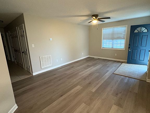 Living Room: New LVP floor and ceiling fan