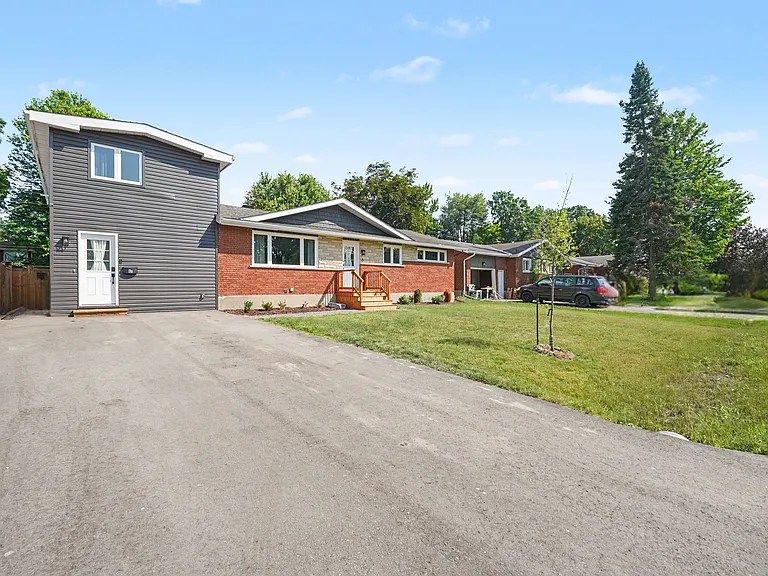 Private paved driveway parking for two vehicles.