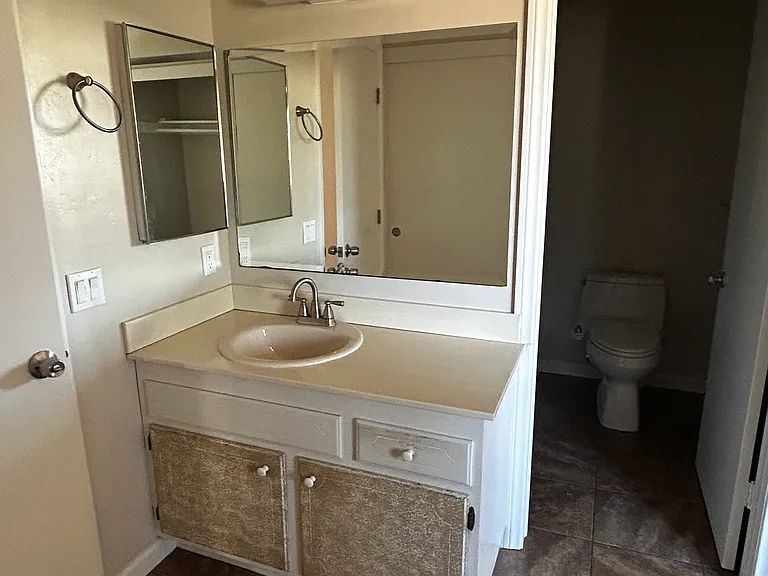 Private vanity/bathroom sink in room
