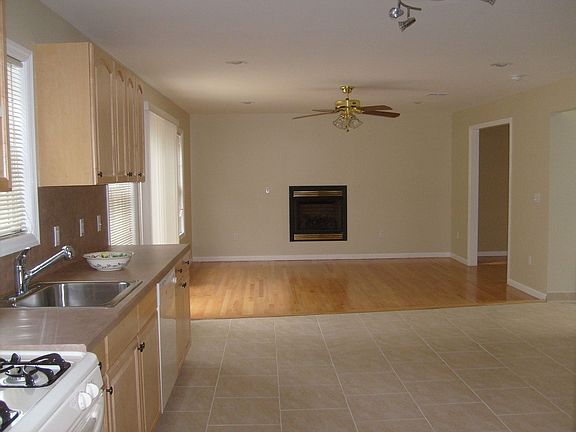 Eat in Kitchen open to the Den w/gas fireplace