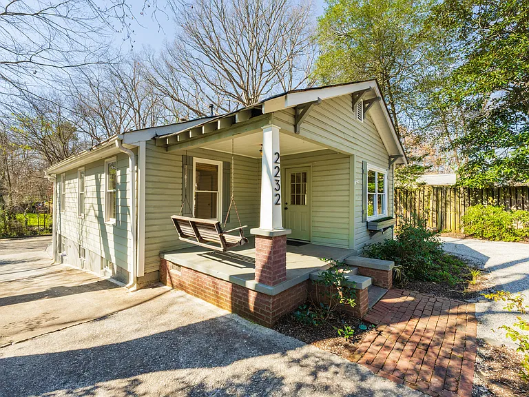 Side view of the Bungalow Duplex to show the driveway and off street parking area