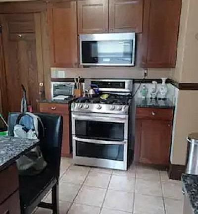 LG Double oven with 5 burner range. Smart Whirlpool Microwave.