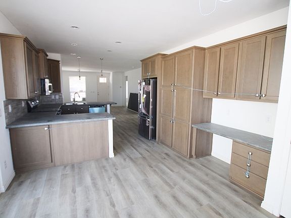 Kitchen with Bank of Cabinets Built-in Desk