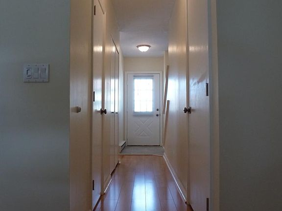 Foyer with coat closet and powder room