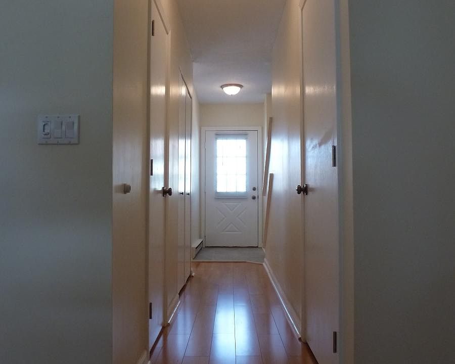 Foyer with coat closet and powder room