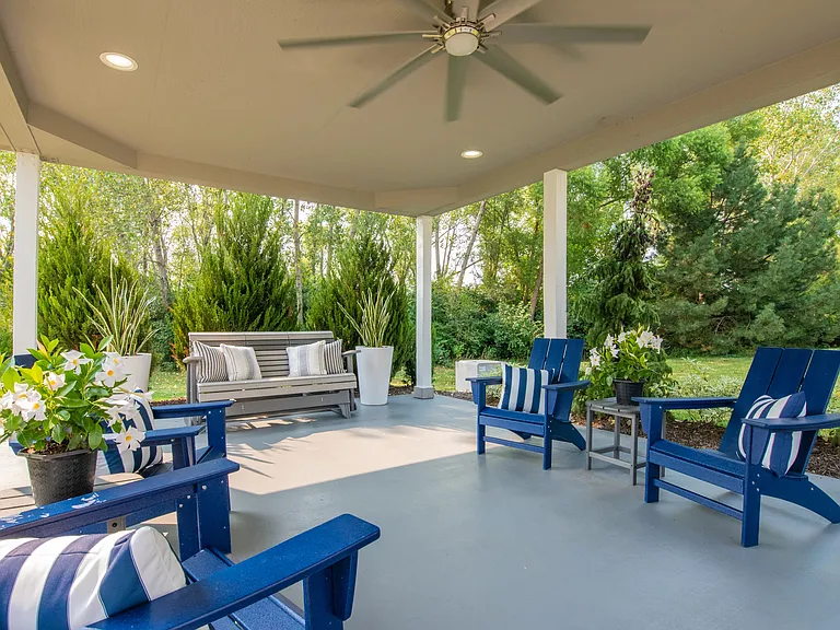 Find shade and relaxation in our covered, outdoor lounge pavilion, near our scenic lake, grilling area, and fire pit.