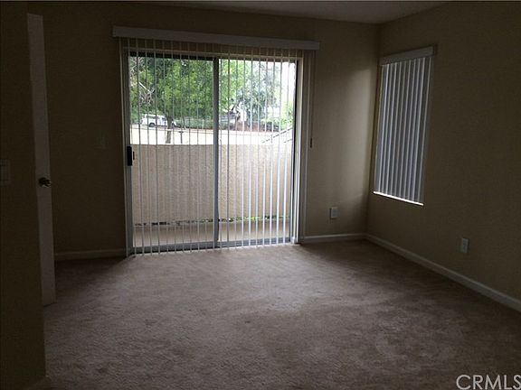 Bedroom with slider to patio. Park View