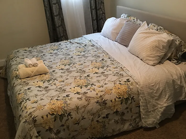 master bed connecting to upstairs balcony. King size