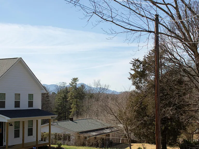 Long range mountain view from the wrap around porch in the back of the house.